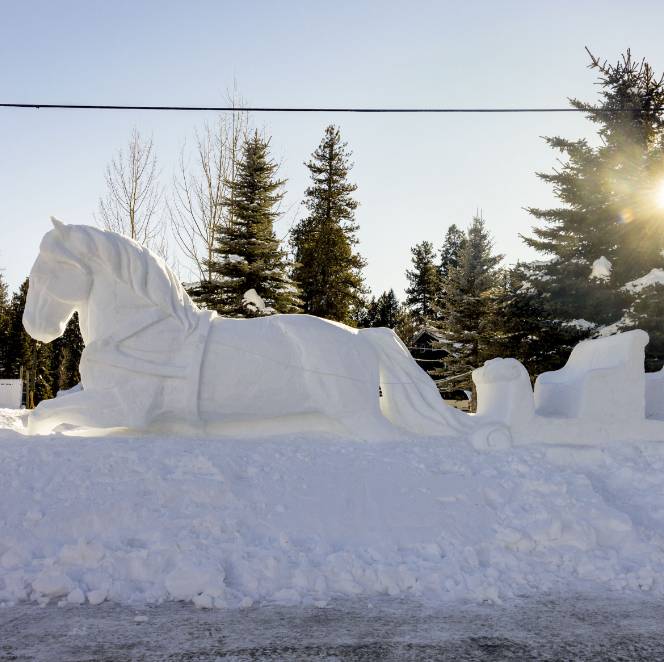 A horse sculpted out of ice and snow.
