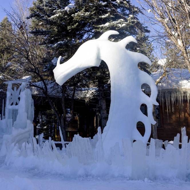 A dragon sculpted out of ice and snow.